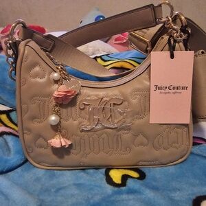 Juicy Couture crossbody bag with flower charm